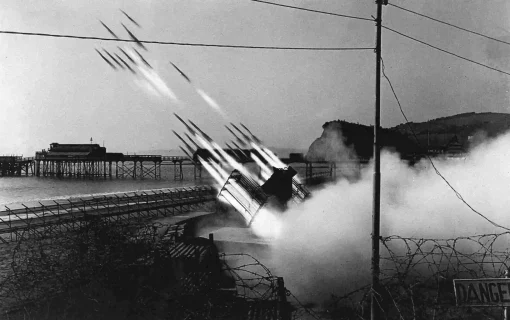 Anti-Aircraft gun firing on Teignmouth's promenade.